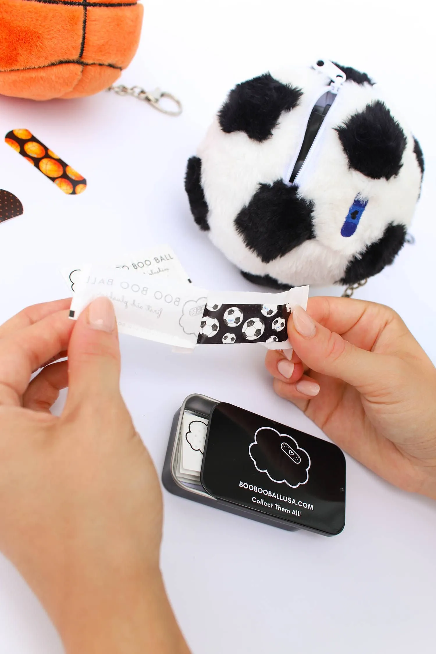 Soccer Ball Keychain - Sports Keychain & First-Aid Kit | Boo Boo Ball
