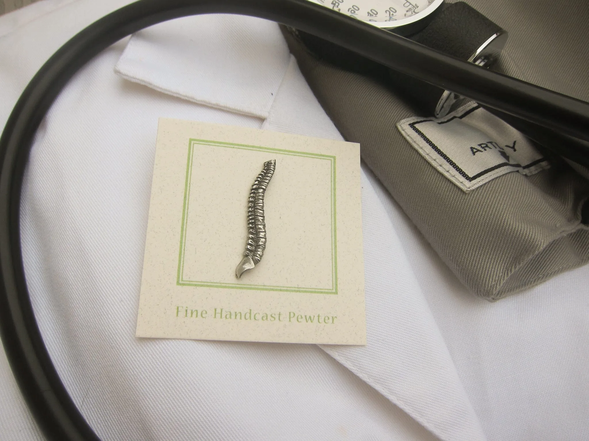 Spine Lapel Pin